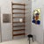 Designed by Kai Kristiansen, this elegant wall-mounted shelving system is a fine example of Danish Modern design from the...