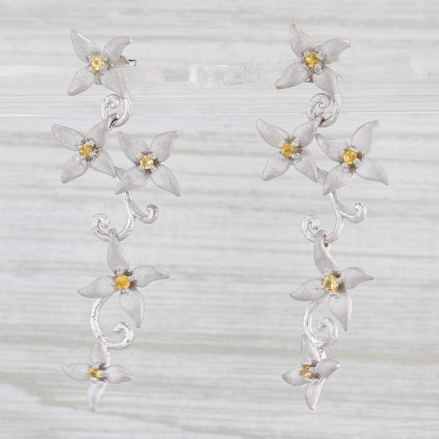 Gemstone Information: - Natural Sapphires - Total Carats - 0.20ctw Cut - Round Brilliant Color - Yellow Treatment - Heated...