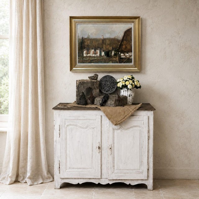 The gentle elegance of Country French craftsmanship is beautifully expressed in this 18th century Provincial painted...