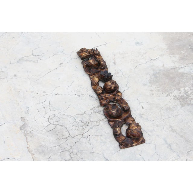 This fine crafted Wooden Baroque Gold Leaf Ornament dates back to the 18th century. Featuring Elaborate Hand-Carved Detail...