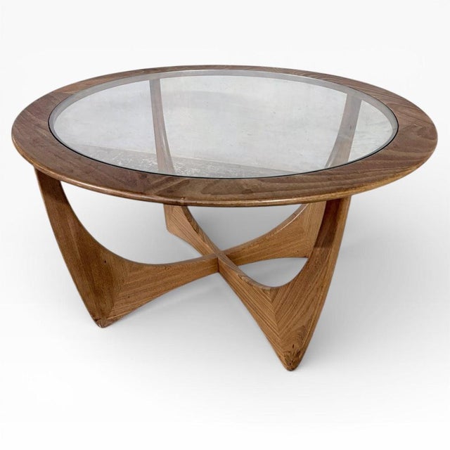 An iconic g plan astro coffee table, celebrated for its timeless mid-century modern design and architectural presence....