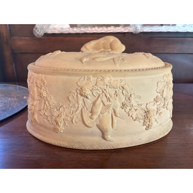 Charming and highly decorative bisque or cream earthenware covered tureen or game pie dish featuring richly molded game,...