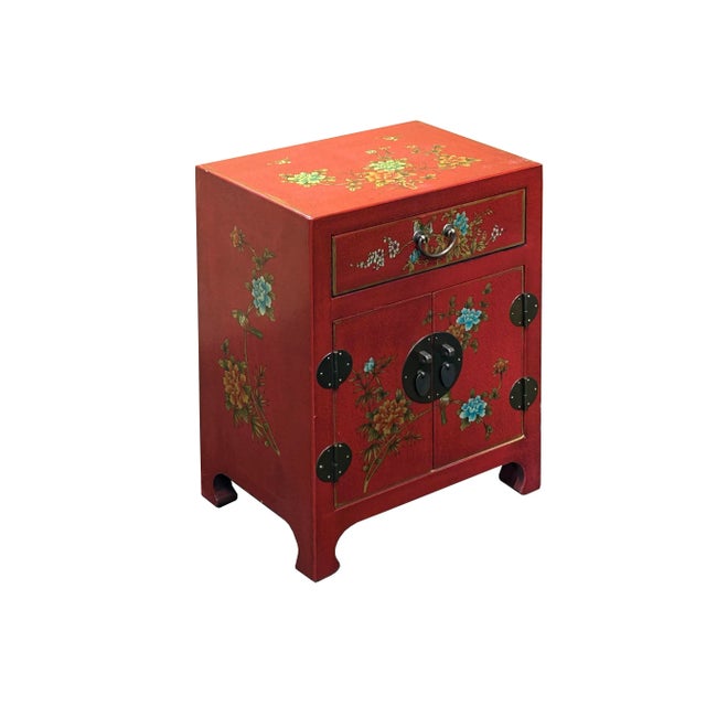 Step into a world of vibrant tradition with this stunning Chinese-style accent cabinet. Finished in a rich paint red, the...