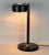 Beautiful, rare and elegant desk lamp, or table lamp. Edited in France during Mid-Century Black lacquered, detail in...