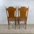 This elegant pair of antique side chairs showcases the refined decorative styling popular at the turn of the twentieth...