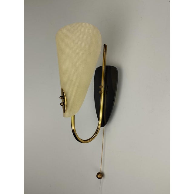 Mid-Century Plastic Wall Lamp, 1950s, in Very Good conditions. Designed 1950 to 1959 Up to 250V (Europe/UK Standard).The...