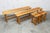 Set of 2 benches and 2 matching stools in solid pine. Some scratches are visible on the seats. The seats are clean and...