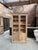 This antique raw oak display cabinet has been fully restored. It consists of two glass doors at the top, which lock and...