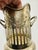 This is a vintage silver or silver-plated holder, possibly used as a wine holder or for decorative purposes. The design...