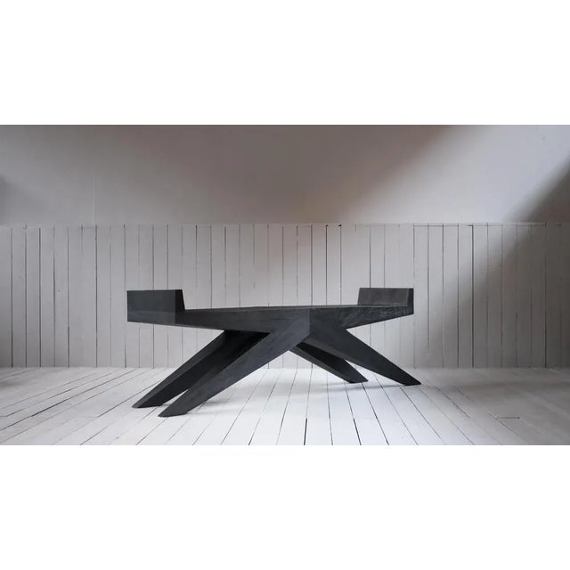 V-bench in Iroko wood by Arno Declercq Dimensions: W 180 x D 38 x H 55 cm Materials: burned and waxed Iroko wood