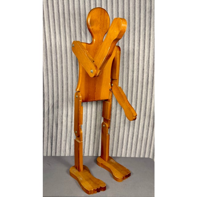 Life Sized Articulating Wood Man Sculpture probably dating from the mid 20th century. It can be posed in a variety of ways...