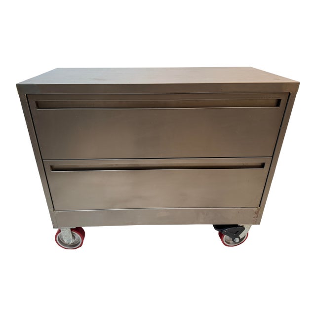 Design Plus Gallery presents a Stainless Steel Cabinet on Casters from Plan Hold. The cabinet rolls into any room and...