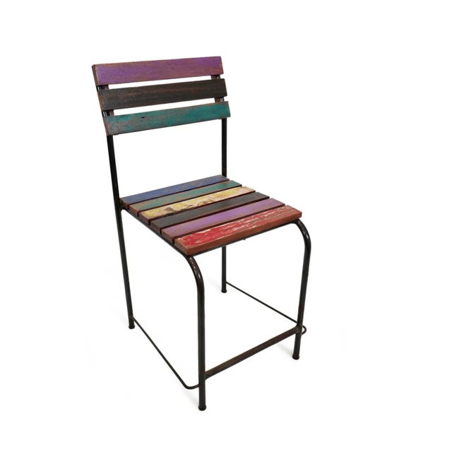 Vintage boat wood and iron dining chair. Each unique in paint colors/coverage and signs of age. Seat height is 19".