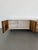 This West Elm Reclaimed Wood and Lacquer Media Console combines rustic charm with modern elegance. It offers a generous...