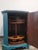 Double door bar cabinet with lacquered body. There are two doors, one in the front and one in the back. Both doors have a...