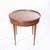 Round table with brass gallery and brass top feet. Has one dovetailed drawer. Would look marvelous in living room or...