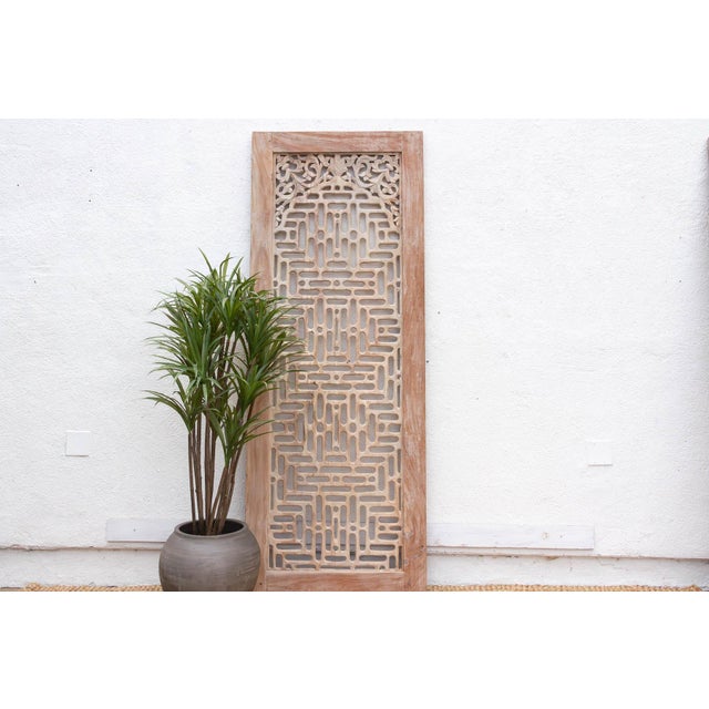 Experience the rhythmic beauty of Southeast Asian wood charm with this carved lattice door. Reconstructed from massive...