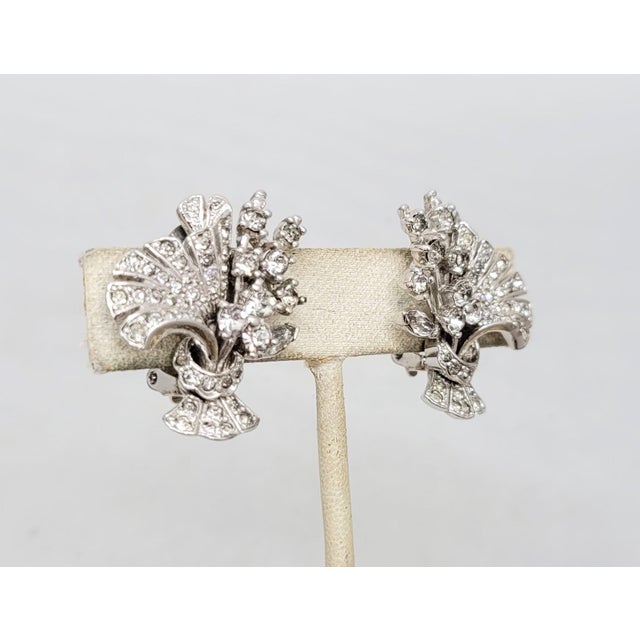 Vintage 1950s Signed Pennino Rhodium Plated Clear Rhinestone Floral Spray Clip Earrings - 2 Pieces For Sale In Philadelphia - Image 6 of 8