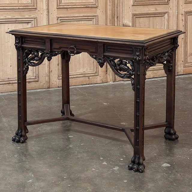 This exceptional 19th-century French Gothic Writing Desk is crafted from richly patinaed solid walnut and showcases the...