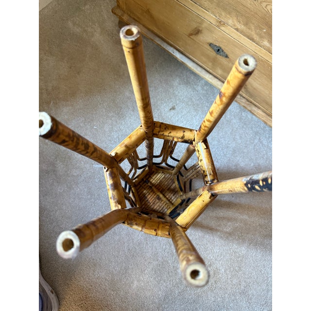 Charming antique scorched bamboo plant stand or display pedestal dating to circa 1890–1910. This unusually slender stand...