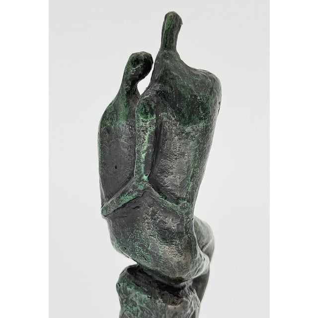 Moshe Sternschuss Mid-century Bronze Lovers Sculpture 183/200, Israel Offered for sale is a cast bronze sculpture of two...