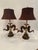 Eye catching pair of stylish faux horn & brass table lamps attributed to Chapman. Paired with handsome custom black...