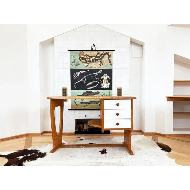 Absolutely fabulous, sculptural desk made of solid pine wood! Three storage drawers on the right side with white accents...