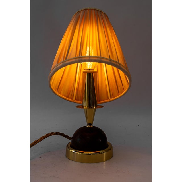 Brass polished and stove enameled The fabric shade is replaced ( new ) The wood is hand polished I have official proof of...