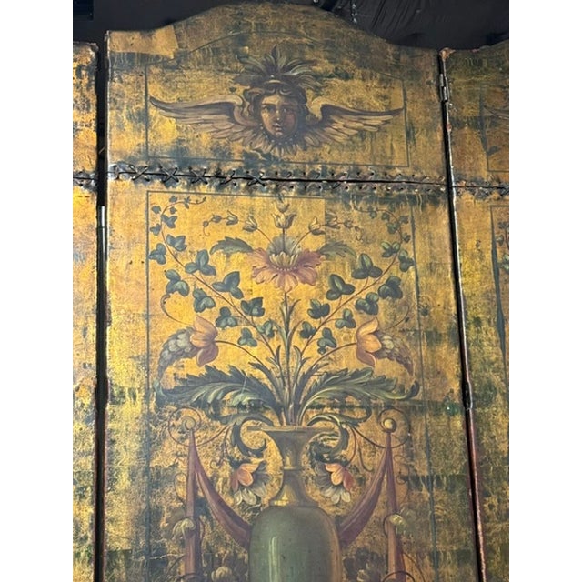 The 19th c. Italian Embossed Leather 5 Panel Screen is a luxurious and elegant room divider that adds a touch of...