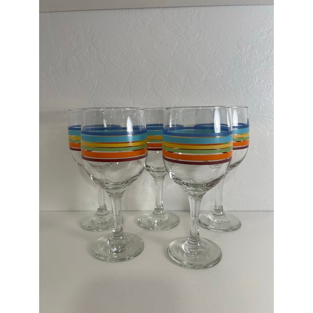 Elevate your drinking experience with this stylish set of Libbey Fiesta Ware Striped Stemmed wine - water Goblets! Perfect...
