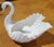 Traditional yet modern, a graceful porcelain swan by Lenox to use as a cany or nut bowl or even an herb planter. Green and...