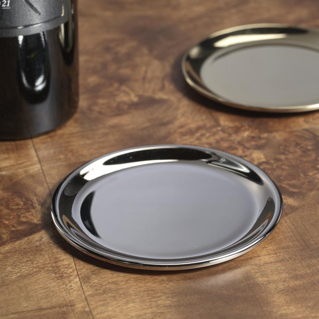 Elevate your wine presentation with the Loire Steel Wine Bottle Coaster set. Made of durable steel with a polished finish,...