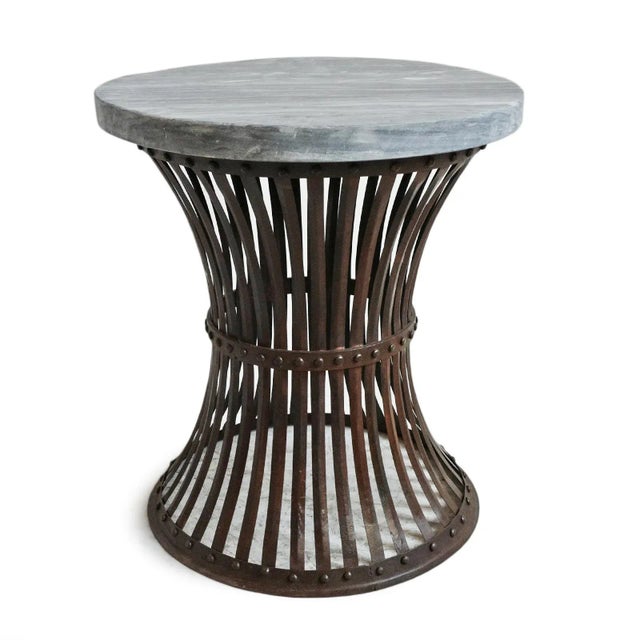 Vintage round grey marble top side table with hourglass shape rust finish iron band base. Modern farm industrial style....
