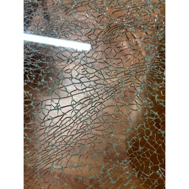 A lovely dining table designed by Steve Chase for a home in Palm Springs. It features a crackle glaze top with a solid...