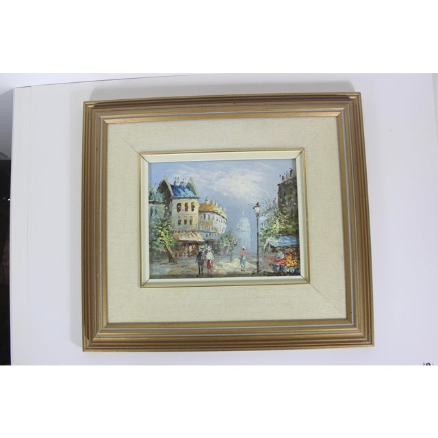 Vintage original oil painting. Impressionist style of a European city scene, likely Paris France. The painting is in good...