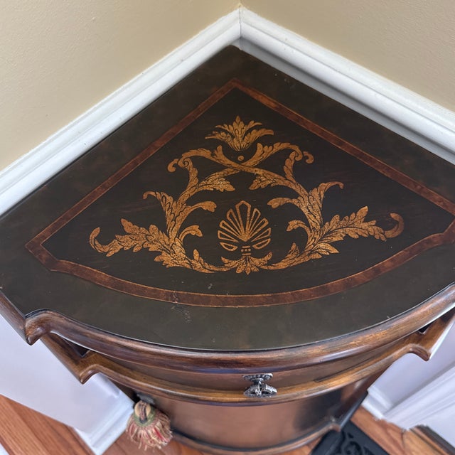 Small corner cabinet, black hand, painted gold