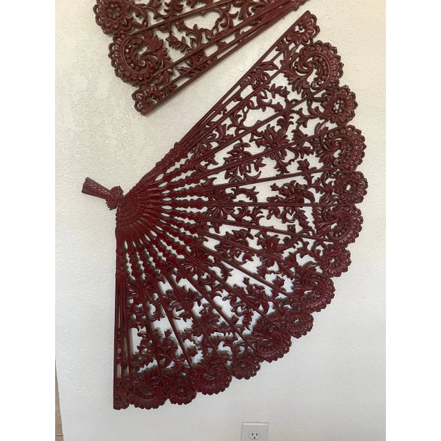 2 Vintage Asian/Hollywood Regency Wall Plaque's. Deep burgundy in color, light weight. Has hooks on back for easy hanging....