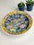 This antique Japanese Meiji Foo-Dog Lion plate features intricate colorful floral decorations, measuring 10 inches in...