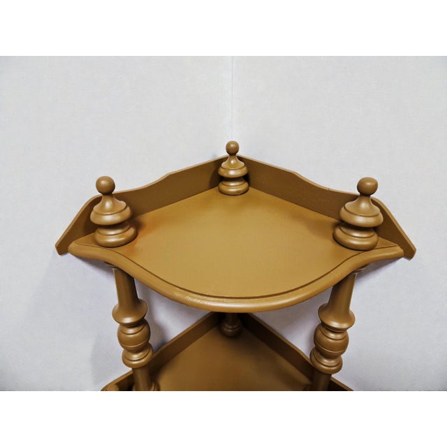 A beautiful turned wooden shelf in the Napoleon III style, repainted in a bronze beige, a color that will blend perfectly...