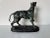 This striking vintage bronze dog sculpture signed Roger captures the noble stance and muscular grace of a hunting hound in...