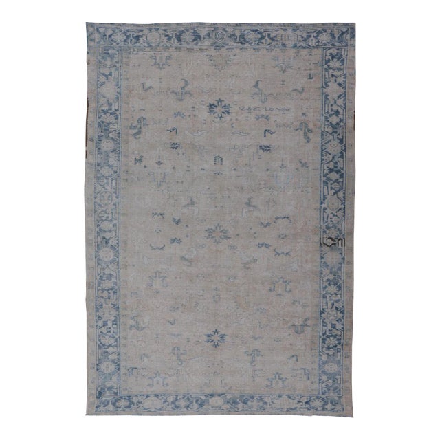 Early 20th Century Antique Persian Heriz Rug With Sub-Geometric Design in Cream and Blue For Sale