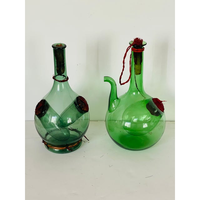 Pair unique blown glass with bubbles Antque American green glass bottles. Collectible and decorative.