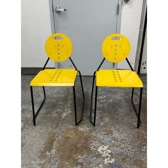 Design Plus Gallery presents a Pair of Chairs made in the Style of Charlie Chairs by Carlo Bimbi & Nilo Gioacchini for...