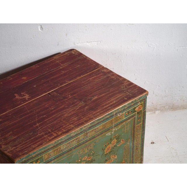 Antique painted chinese trunk in pine wood, provincial painted furniture with floral composition originating from dongbei...