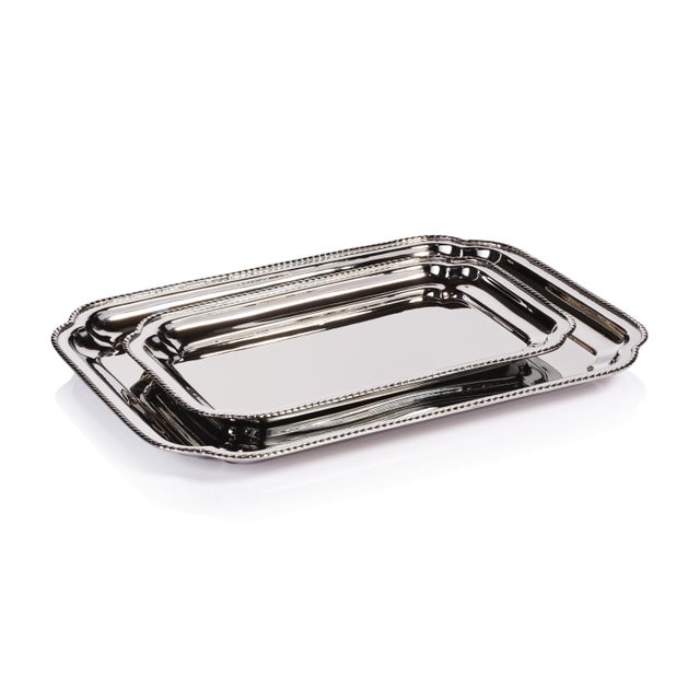 Timeless elegance meets modern craftsmanship in the Andrea Brass Tray. Featuring a polished nickel finish, this curved...