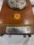 This listing is for a nice antique English mantel/shelf clock. This clock has a wooden case and metal dial. The casing has...