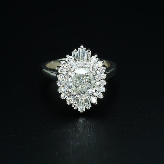 This gorgeous art deco style platinum and diamond cocktail ring is a gorgeous and sophisticated ring sure to draw...