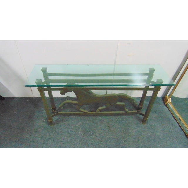 Modern design console table , cast aluminum base with galloping horse , faux painted marbleized finish , glass top