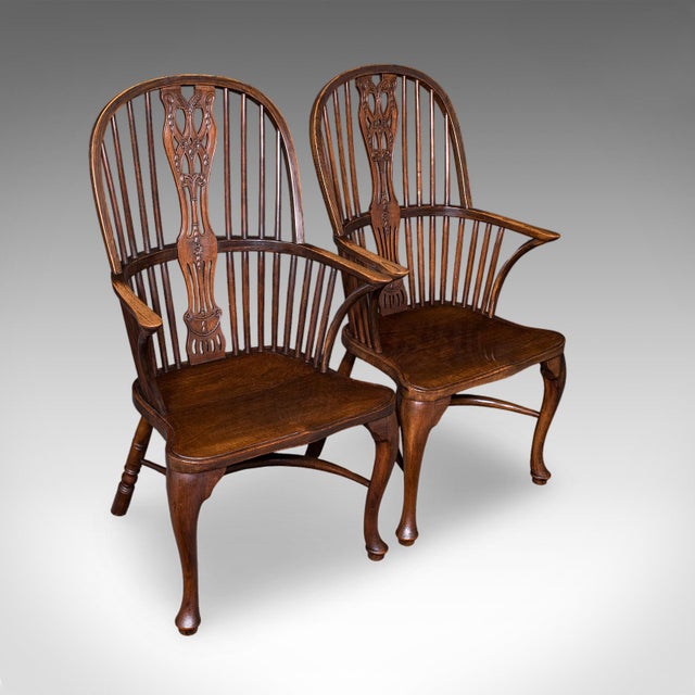 This is a rare set of 6 vintage Windsor chairs. An English, ash and beech elbow or armchair, in Victorian country house...