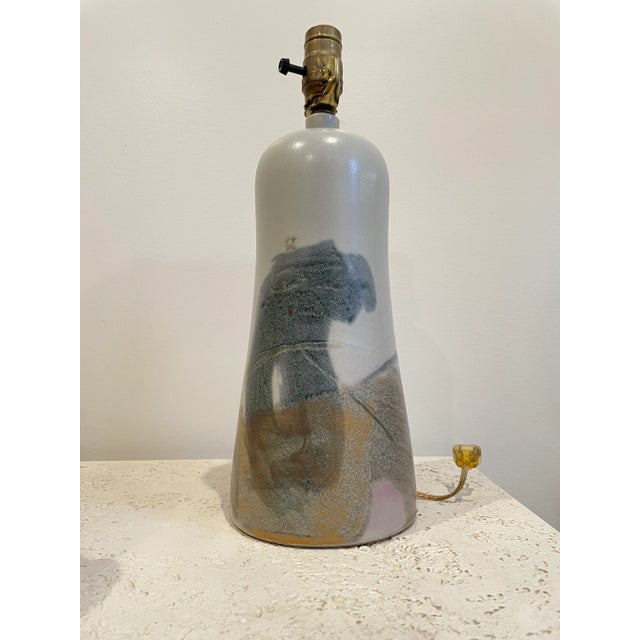 Great ceramic lamp. Heavy clay with unique glaze design. Warm color palette to include whimsical stars.